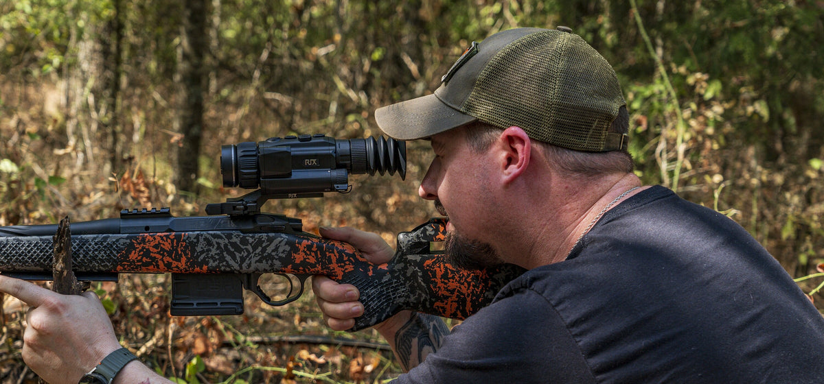 Hunter aiming a RIX Storm S6R V2 thermal riflescope